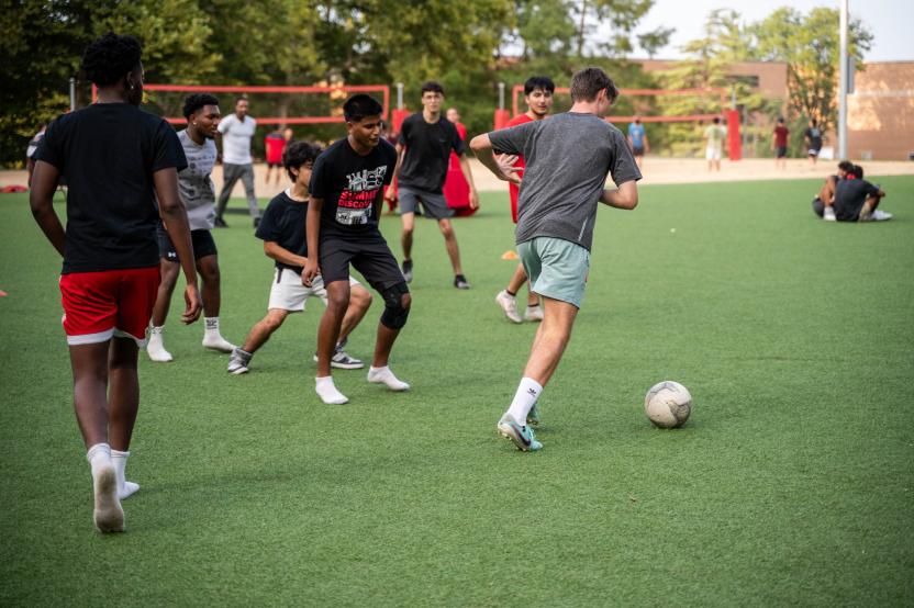 men playing soccer on la plata beach