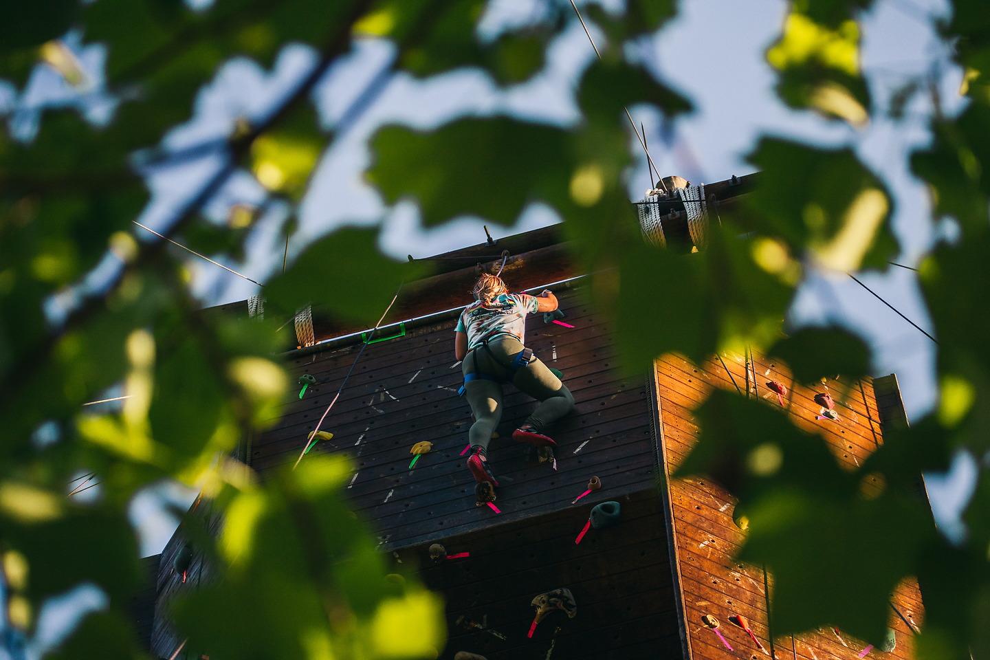 woman rock climbing