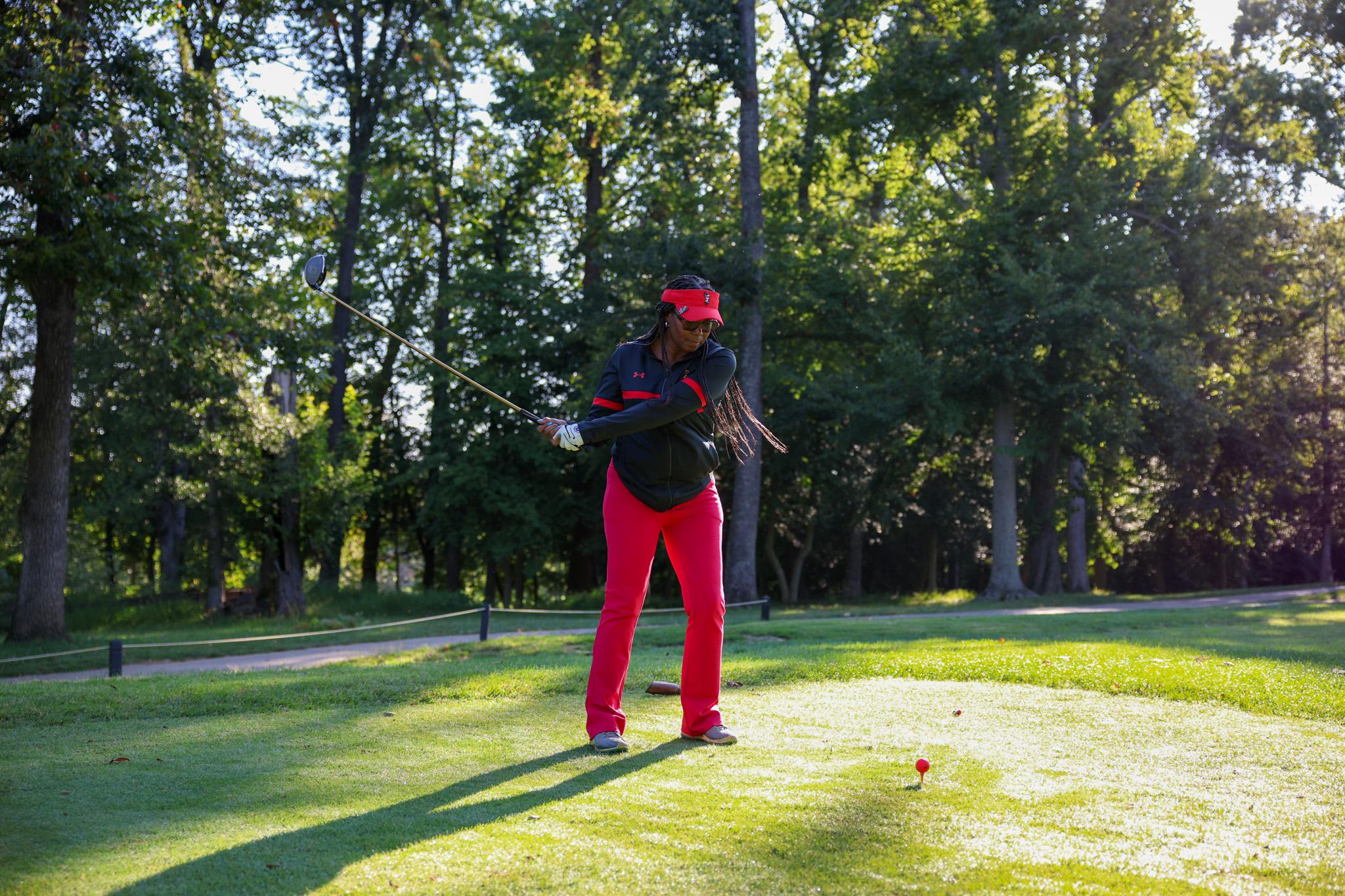 woman playing golf